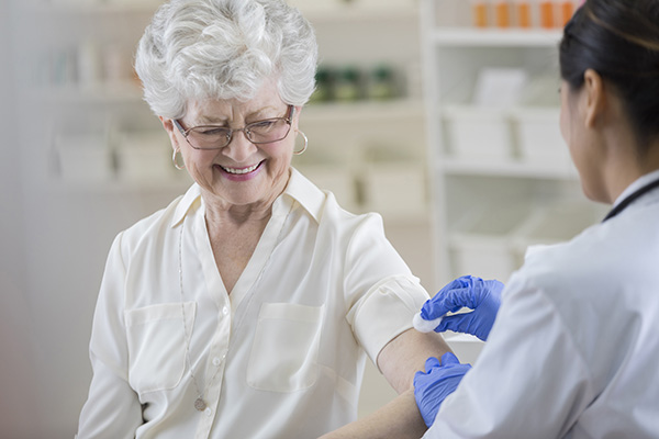 woman getting a flu jab